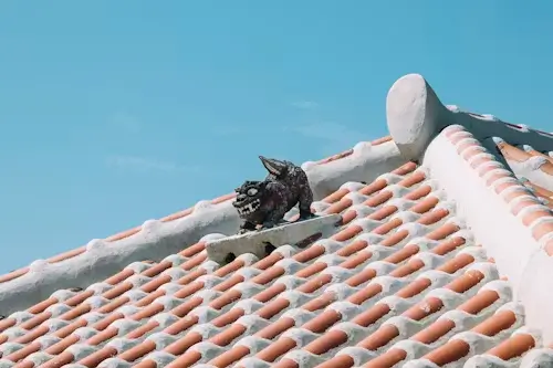 Homeowner checking roofing insurance and contractor registration