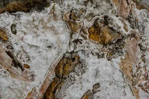 Hard water stain remover for windows comparing retail products with professional restoration services.